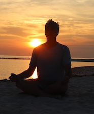 Meditating on a sand bar